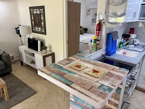 Coffee/tea maker, fridge, microwave, oven