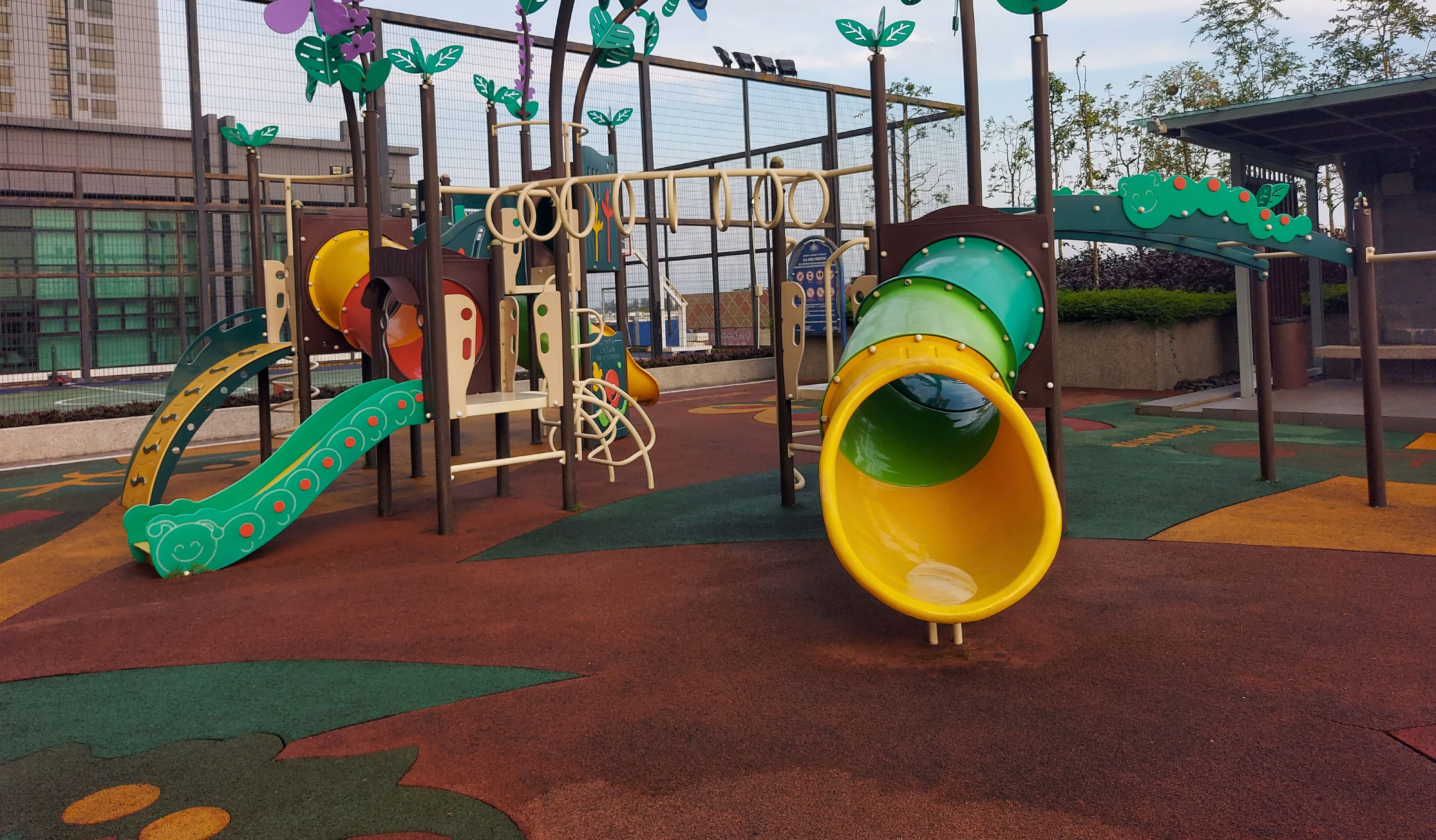 A playground with slides and climbing structures.