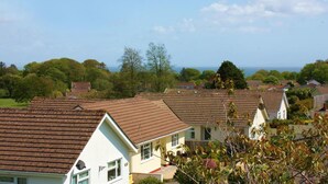 Unclassified image, 3 of 17, button - Detached Holiday Home With Beautiful Conservatory, Decorative Fireplace, and Charming Garden (Saundersfoot)
