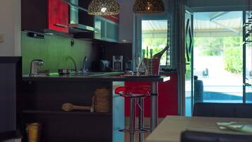 Villa | Private kitchen | Electric kettle, highchair