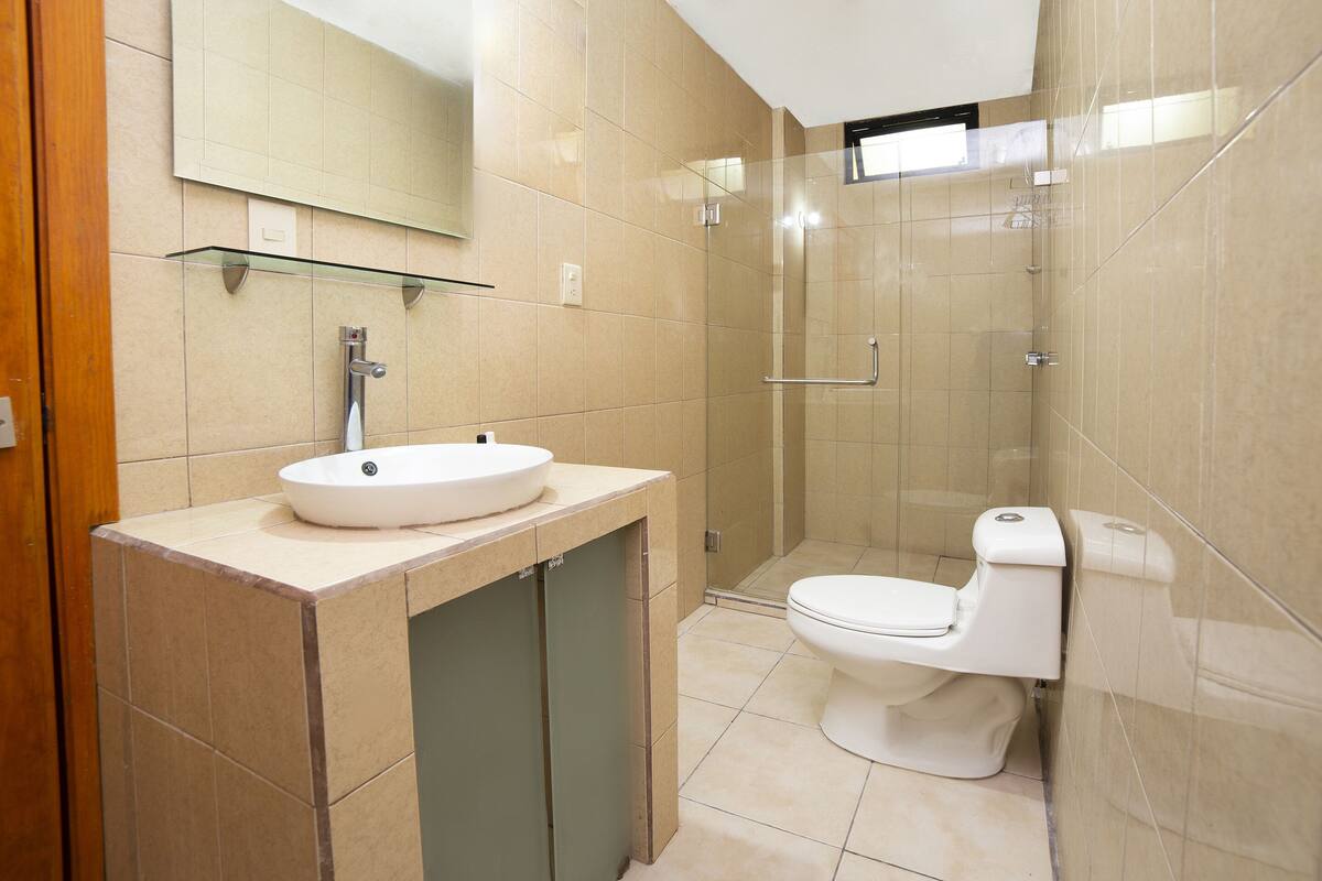 Shower, free toiletries, towels, soap