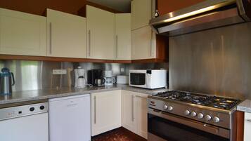 Cottage | Privékeuken | Een kinderstoel