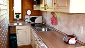 Casa | Cozinha privada | Cafeteira/chaleira, geladeira, micro-ondas, torradeira