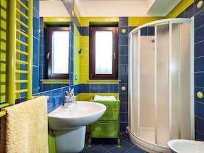 Villa | Bathroom | Shower, hair dryer, towels