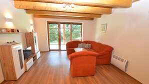 Appartement | Woonkamer | Een open haard