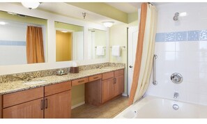 Combined shower/tub, hair dryer, towels, soap
