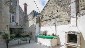 Unclassified image, 2 of 20, button - Comfy Apartment in Bayeux. Communal Terrace/livingroom and Kitchen (Bayeux)