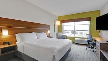 Standaard kamer, 1 kingsize bed | Een kluis op de kamer, een bureau, een laptopwerkplek