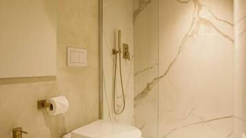 Shower, free toiletries, hair dryer, slippers