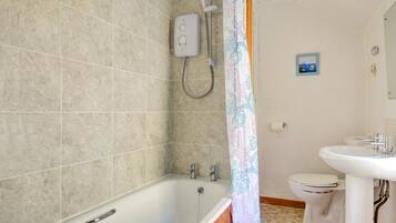 Combined shower/bathtub