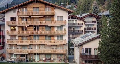 Top vacation apartment for families, large play and sunbathing area, central and quiet