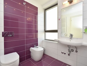 Villa | Bathroom | Bathtub, towels
