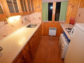 House | Private kitchen | Fridge, microwave, oven, dishwasher - Detached House With a Covered Terrace Near the Slopes (Polevsko)