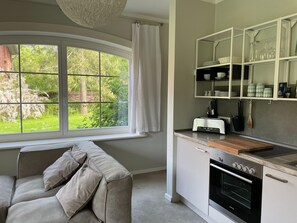 Apartamento | Cocina privada | Trona infantil