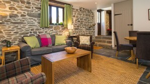 Ferienhaus | Wohnzimmer | Kamin
