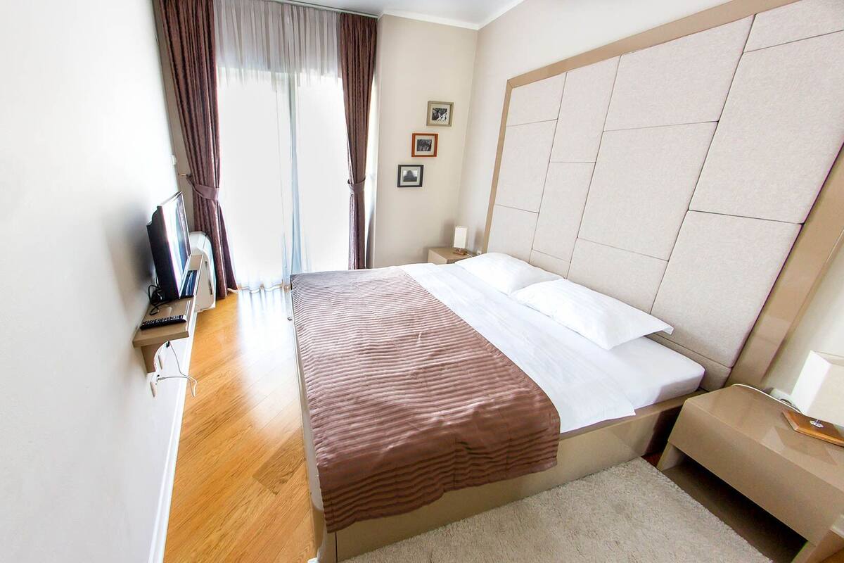 Family Suite, Balcony, City View | Soundproofing, iron/ironing board, WiFi (free), bed sheets