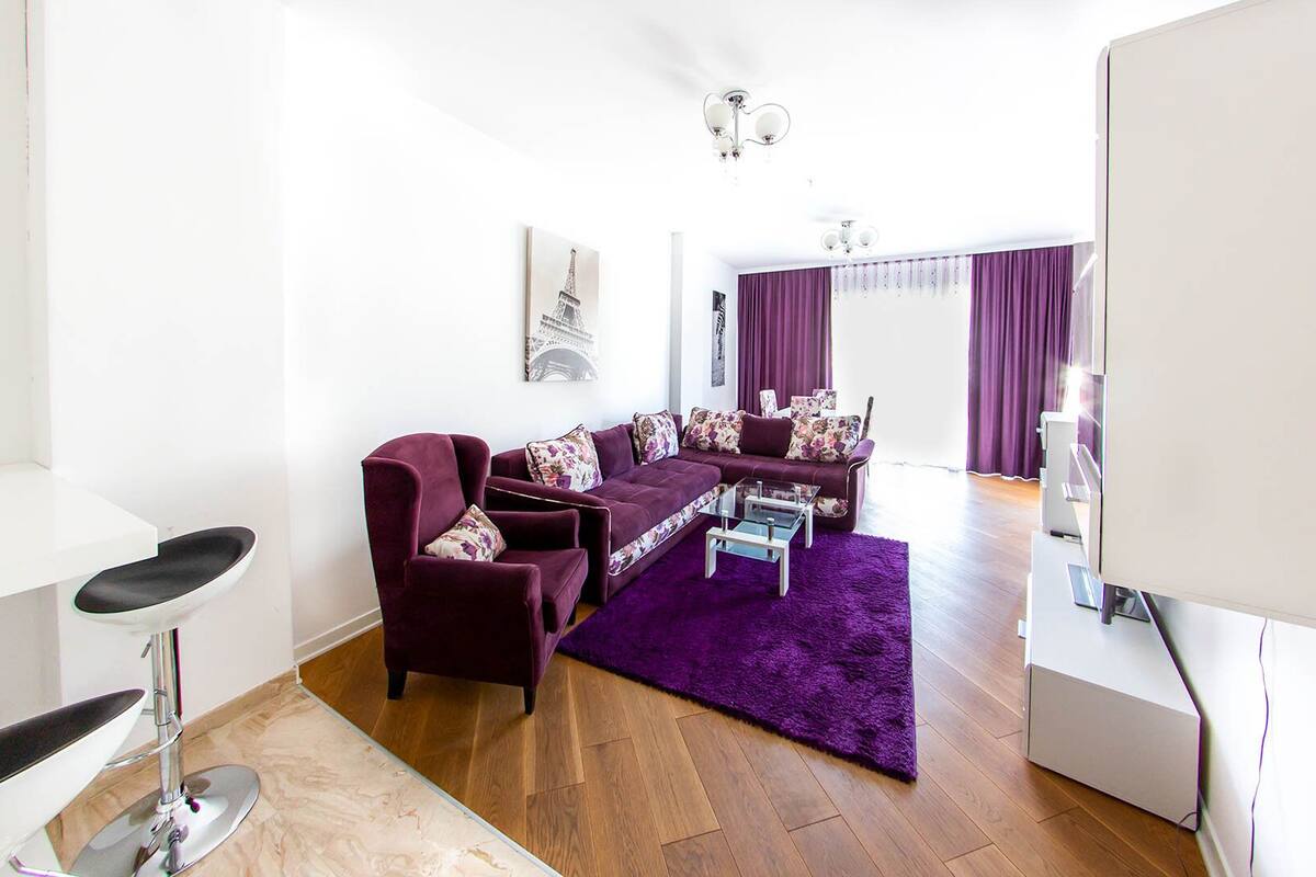 Superior Apartment | Living area | Flat-screen TV
