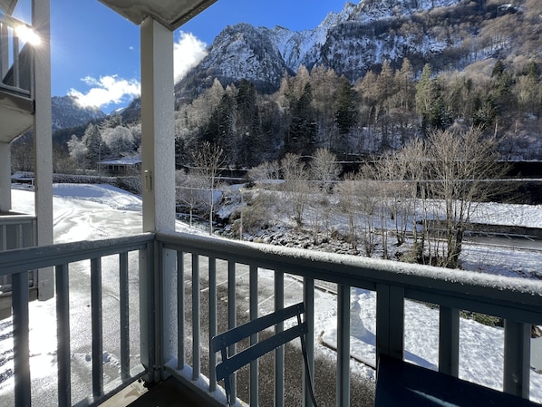 A snowy mountain landscape with a clear sky.