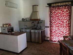 Villa, 1 Bedroom | Private kitchen | Full-sized fridge, oven, stovetop, cookware/dishes/utensils - Casale Oasi (Pozzallo)