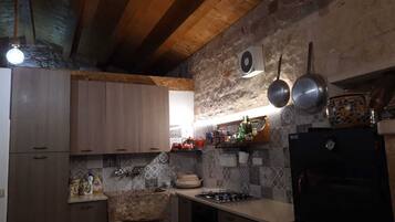 Villa, 1 Bedroom | Private kitchen | Full-size fridge, oven, stovetop, cookware/dishes/utensils