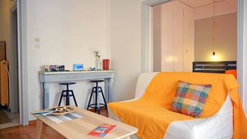 City Apartment | Living area | 40-inch flat-screen TV with digital channels, LCD TV