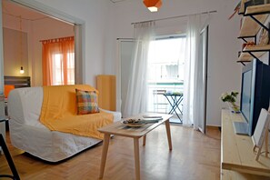 City Apartment | Living area | 40-inch flat-screen TV with digital channels, LCD TV