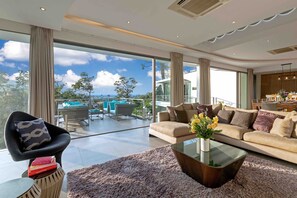 Flat-screen TV, DVD player, books
