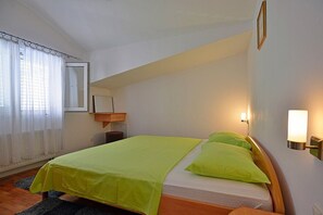 2 quartos, acesso à internet, roupa de cama
