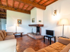 Ferienhaus | Wohnzimmer | Kamin