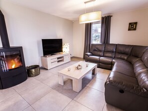 Ferienhaus | Wohnzimmer | Kamin