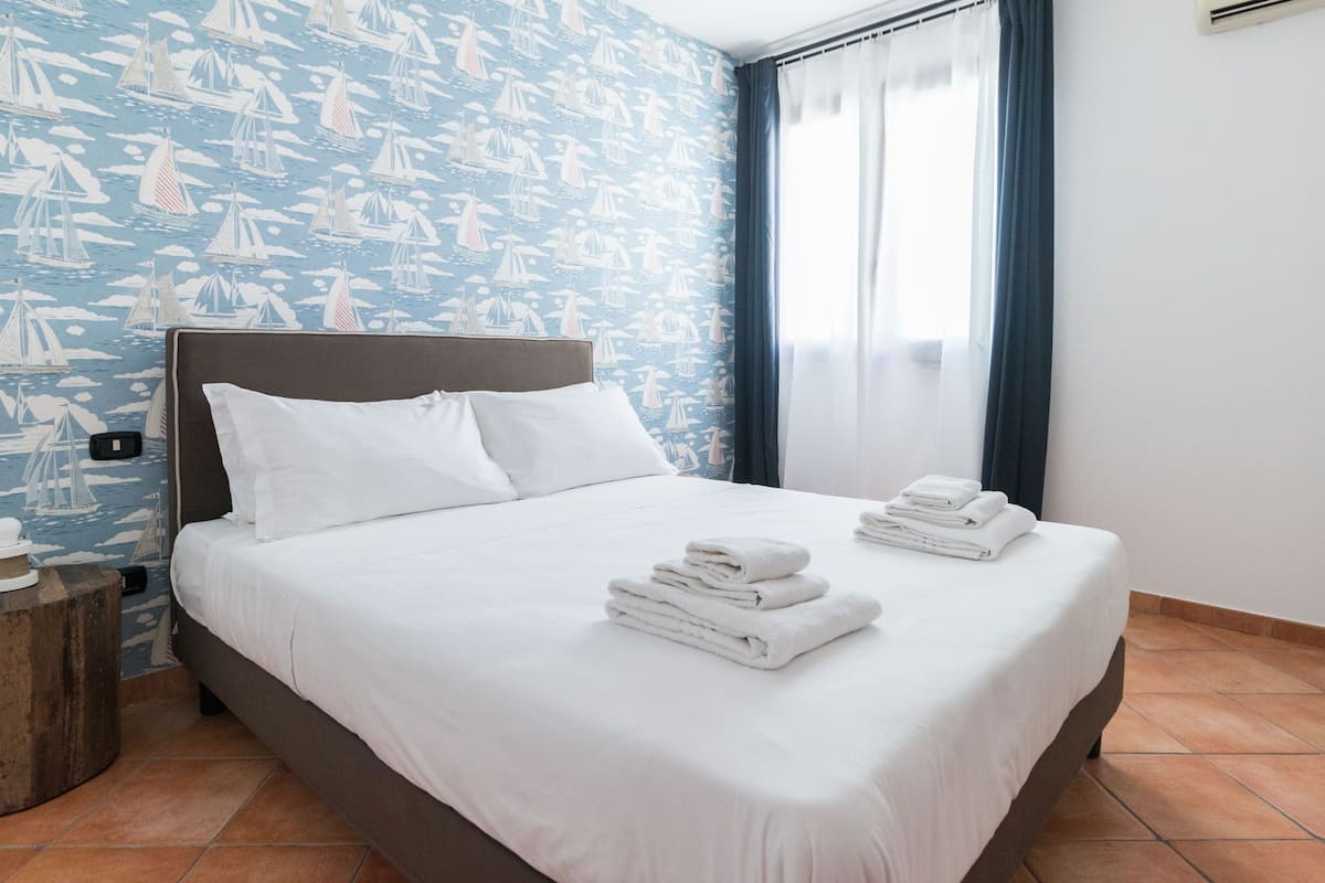 Apartment, 2 Bedrooms (E) | 2 bilik tidur, seterika/papan seterika, Wi-fi percuma, cadar katil