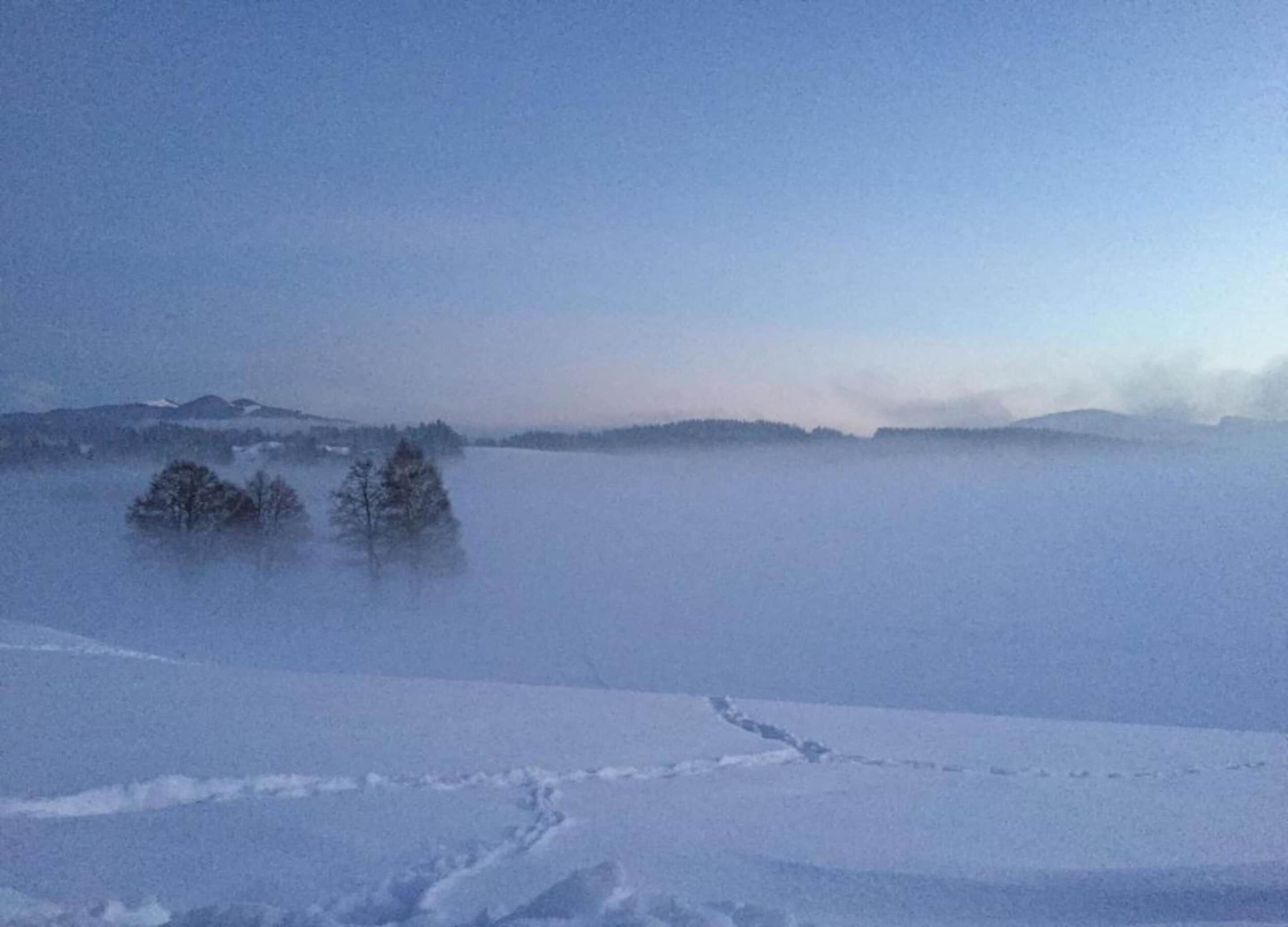 A snowy landscape with a clear sky.