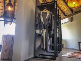 Luxury Suite | Bathroom amenities | Separate bathtub and shower, rainfall showerhead