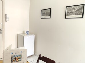 Apartamento superior | Sala de estar | TV