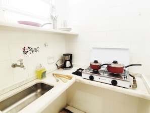 Apartamento | Cozinha privada | Talheres/pratos/utensílios de cozinha