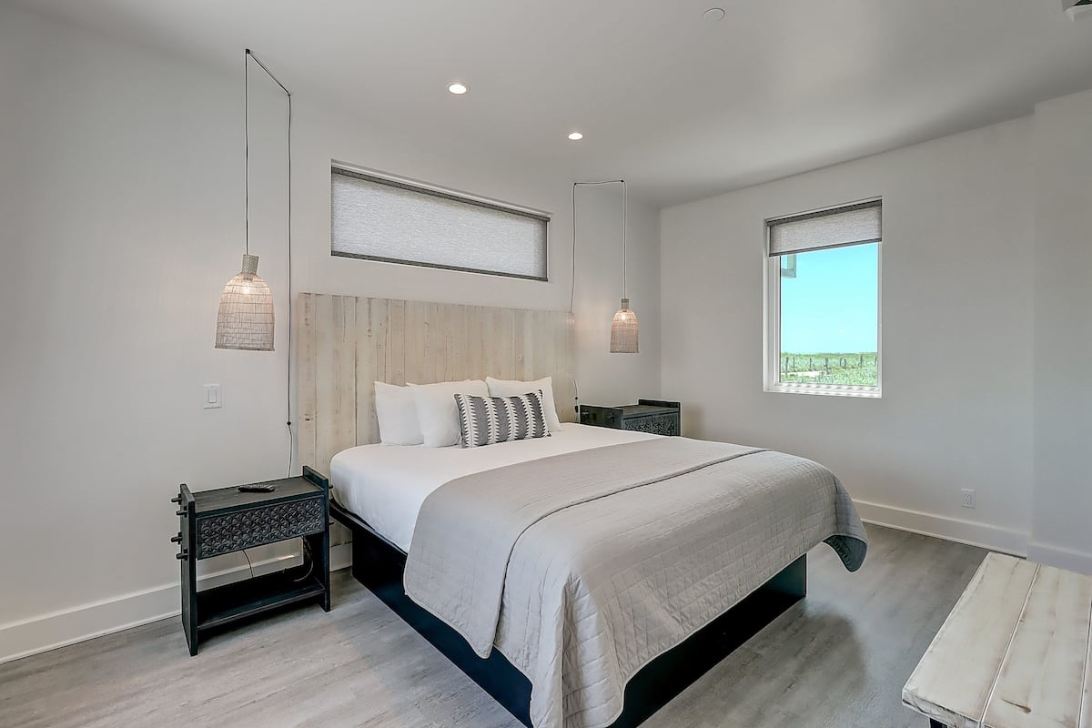 Deluxe Room, Multiple Beds, Pool View | 1 bedroom, desk, laptop workspace, iron/ironing board