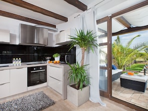 Villa | Private kitchen | Fridge, microwave, oven, dishwasher