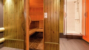 A wooden sauna room with a glass shower area. - Holiday Home with Sauna, Garden, Terrace, BBQ & Fireplace (Waimes)