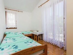 Apartamento | 2 quartos, individualmente mobiliados, roupa de cama