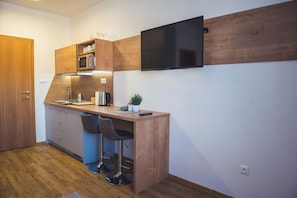 Comfort Studio | Private kitchen | Fridge, microwave, stovetop, electric kettle - Vila Anna (Besenova)