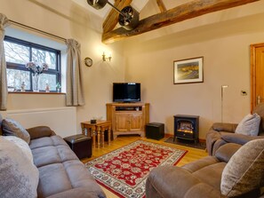 Fireplace, DVD player - Luxurious Holiday Home in Llanrwst Near River (Llanrwst)