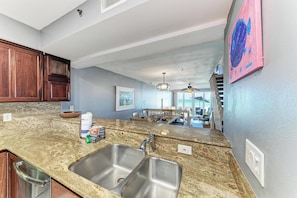 Fridge, stovetop, dishwasher - Hidden Cove 3 - Gulf Front Anna Maria - by Island Real Estate (Holmes Beach)
