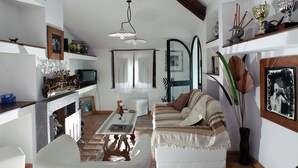 Ferienhaus | Wohnzimmer | Kamin