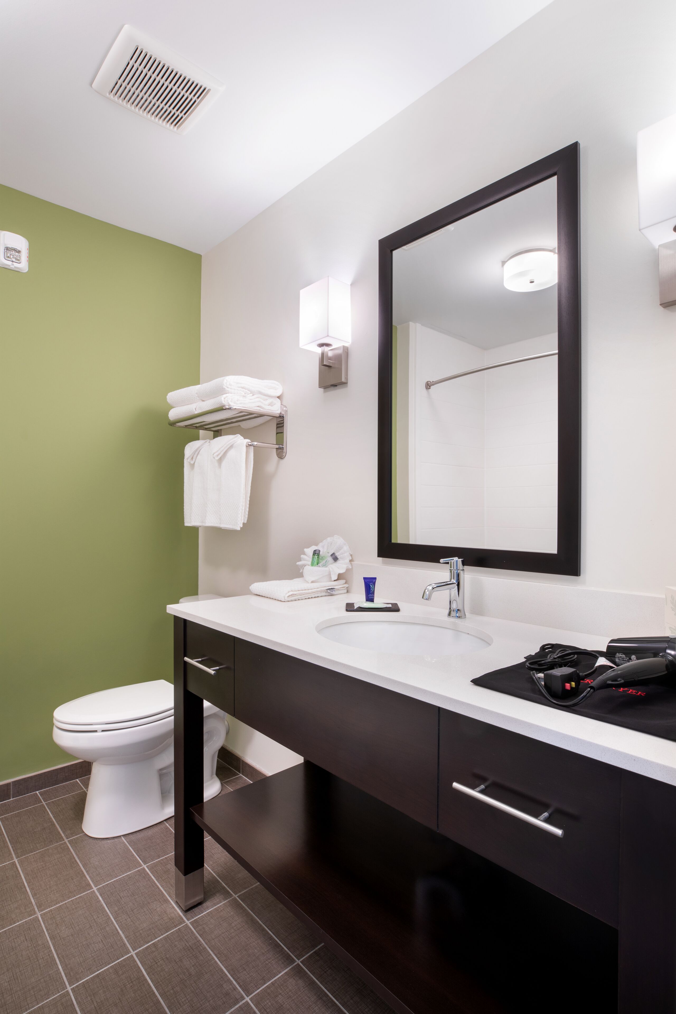 hair dryer, towels, soap, shampoo