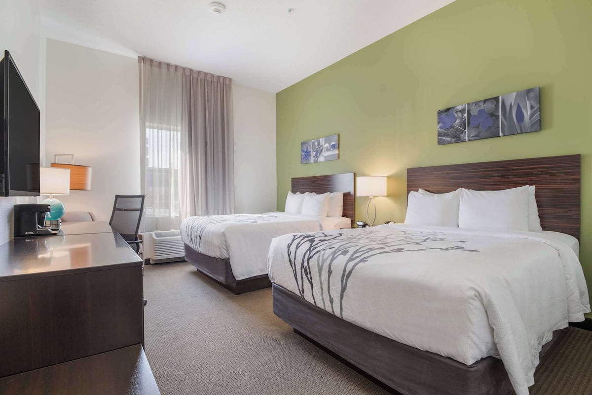 Premium bedding, desk, blackout drapes, iron/ironing board