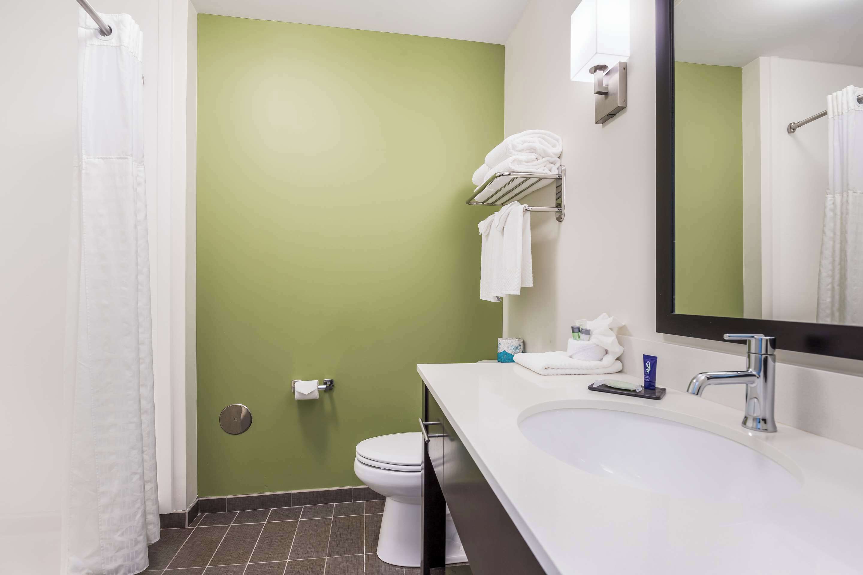 premium bedding, desk, blackout curtains, iron/ironing board