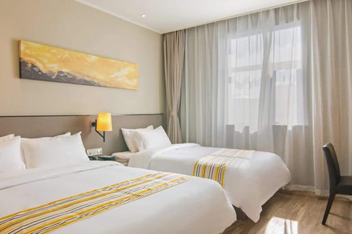 family room | desk, blackout curtains, iron/ironing board, free wifi