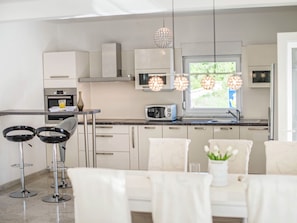 Villa | Private kitchen | Fridge, microwave, dishwasher, coffee/tea maker