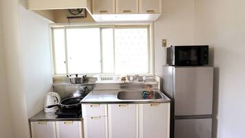 Apartment 201 | Private kitchen | Fridge, microwave, stovetop, electric kettle