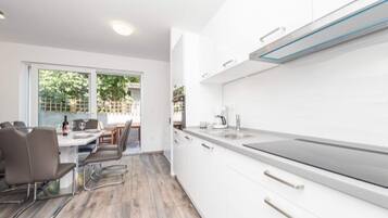 Apartment | Private kitchen | Electric kettle, highchair